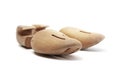 Selective focus of men`s wooden shoe stretcher isolated on a white Royalty Free Stock Photo