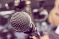 selective focus microphone and blur musical equipment guitar ,bass, drum lyric stand, background. Royalty Free Stock Photo