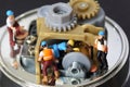 Selective focus of miniature engineer and worker fixed and repair musical box and use for business background