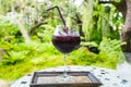 Selective focus Mixed Berries Drink against tree background