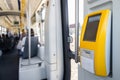 Selective focus on modern ticket validator with empty screen in city public transport Royalty Free Stock Photo
