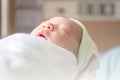 Selective focus of mother looking asian newborn baby boy sleeping in grandmother hand at hospital Royalty Free Stock Photo