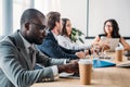 selective focus of multicultural business people having business meeting