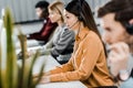 Selective focus of multiethnic call center operators working Royalty Free Stock Photo