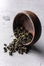 selective focus, natural green leaf tea in a wood bowl Royalty Free Stock Photo