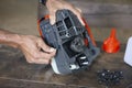 selective focus New lumberjack tools Disassemble, reassemble Gasoline engine lumberjack just bought new to use to cut branches in Royalty Free Stock Photo