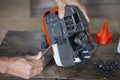 selective focus New lumberjack tools Disassemble, reassemble Gasoline engine lumberjack just bought new to use to cut branches in Royalty Free Stock Photo