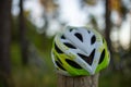 Selective focus of a new white and green biking helmet Royalty Free Stock Photo