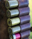 Selective focus. old, shabby hunting holster with cartridges.