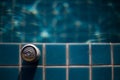 selective focus, one can of white beer placed on the edge of the pool bright blue water background feel fresh The background image Royalty Free Stock Photo