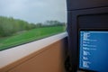 Open laptop or notebook, working as programmer and do some coding on the train during commute. Royalty Free Stock Photo