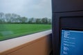 Open laptop or notebook, working as programmer and do some coding on the train during commute. Royalty Free Stock Photo