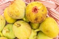 selective focus, organically grown figs in a wicker basket. Top view