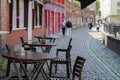 Outdoor table and chair without people in front of cafe, bar, and restaurant in walking street old town DÃÂ¼sseldorf, Germany. Royalty Free Stock Photo