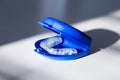 Selective focus photo of an acrylic bite guard in its blue case