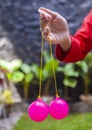 Selective focus photo of Lato-Lato, a traditional children`s toy which is currently going viral, especially in Indonesia.