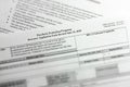 Selective focus photo of paycheck protection program borrower application form revised. paycheck protection program new round Royalty Free Stock Photo