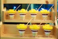 Selective focus photo of Seasonal Tropical Mango Fruit creamy trifle in beautiful glasses with fresh ripe fruit slices on table ba Royalty Free Stock Photo