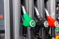 Colorful Petrol pump filling nozzles , Gas station in a service Royalty Free Stock Photo