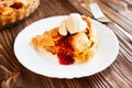 Selective focus on piece of american apple pie with ice cream. Tasty home made apple pie composition. Layout or still life with Royalty Free Stock Photo