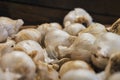 Selective focus of a pile of garlic in a box in the market Royalty Free Stock Photo