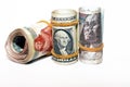 Pile of American dollars rolls with rolled up Egyptian money banknote bills of 100 LE, 200 LE Royalty Free Stock Photo