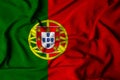 selective focus of the portugal flag, with waving fabric texture. 3d illustration