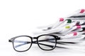 Selective focus on reading eyeglasses with stacking of newspaper Royalty Free Stock Photo