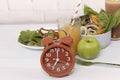 Red clock  and it time healthy food  with breakfast and Intermittent fasting diet food concept Royalty Free Stock Photo