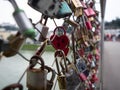 Selective focus of red heart shaped love lock on Makartsteg bridge Marko Feingold Steg, Salzach river Salzburg Austria Royalty Free Stock Photo