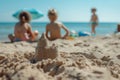 Selective focus on a sandcastle on a sandy beach Royalty Free Stock Photo