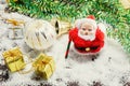 selective focus santa doll on snowflake and blur Christmas decor Royalty Free Stock Photo