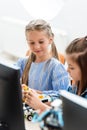 Selective focus of schoolgirls programming robot