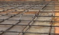 Screw thread steel bar framework in the construction site. Steel Rebars for reinforced concrete. Building Construction background