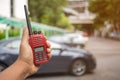 Selective focus of the Security guard uses radio communication for facilitate traffic. Traffic Officers use radio communication to