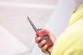 Selective focus of the Security guard uses radio communication for facilitate traffic. Traffic Officers use radio communication to