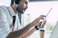 selective focus of serious call center operator using digital tablet. Royalty Free Stock Photo