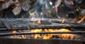 Selective focus shot of a barbeque fire in a garden