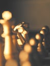 Selective-focus shot of the chess golden knight figure on a chessboard Royalty Free Stock Photo