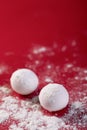 Selective focus shot of Chinese sweet dumplings on a red background Royalty Free Stock Photo