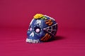 Selective focus shot of a decorated colorful skull - Halloween Theme