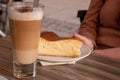 Selective focus shot of delicious cheesecake with ice coffee Royalty Free Stock Photo