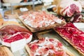 Selective focus shot of delicious ham served on wooden platters