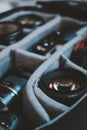 Selective focus shot of digital camera lenses in a lens bag Royalty Free Stock Photo