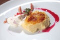 Selective focus shot of fig dessert with vanilla ice cream, strawberries and strawberry jam Royalty Free Stock Photo