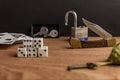 Selective focus shot of a half-open knife on a wooden surface