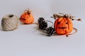 Selective Focus Shot Of Halloween Pumpkin Embroideries, Cones, And A Jute Twine
