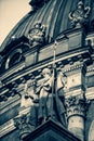 Selective focus shot of a historical statue on a gothic building background