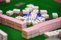 Selective focus shot of mahjong tiles on a table Royalty Free Stock Photo