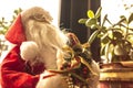 Selective focus shot of a manlike Santa Claus toy